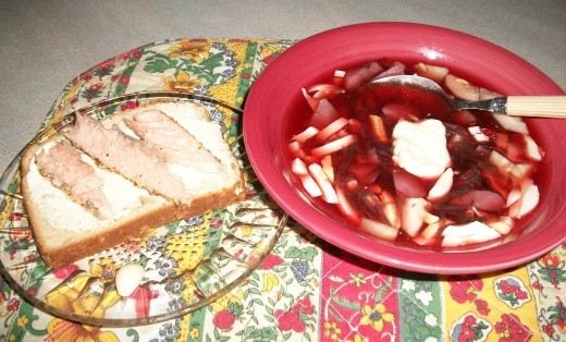 Add cold beet soup. Add a spoon of sour cream, butter milk, mayo (whatever you like most). Bread with smoked salmon and garlic will add the pleasure.