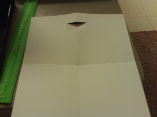 Open the card back up and cut slits along the half-fold height line.