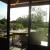 The glass front of the restaurant opens onto the terrace and Limousin countryside The glass front of the restaurant opens onto the terrace and Limousin countryside