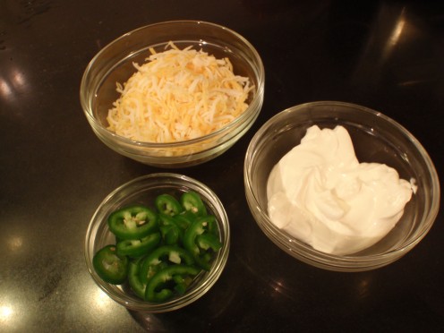 The garnishes await: Cheese, sour cream, jalapeos and cilantro.