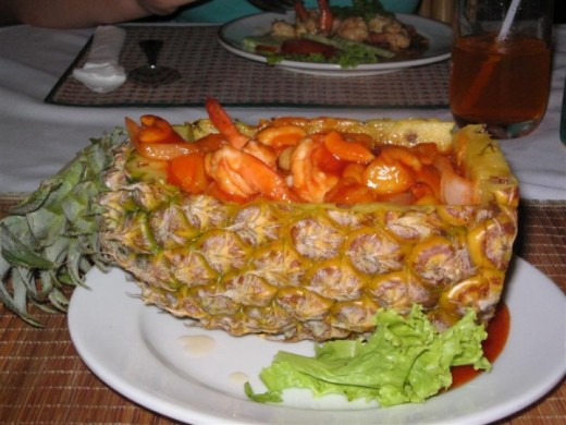 Banana Leaf Restaurant on Canal Road offers amazing cuisine such as prawns in a pineapple basket.