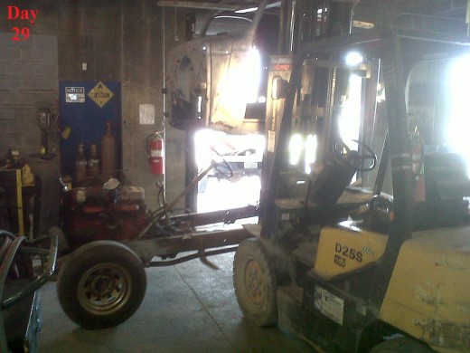 This pic is terrible, but it's a picture of my boss's 1946 Chevy pickup cab being lifted off the frame with the help of a forklift.