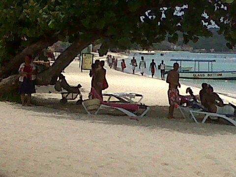 Sea, sand, sun, and shade.  Negril Beach, Jamaica.