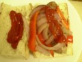 Italian Sausage Sandwich with Red Peppers and Red Onions