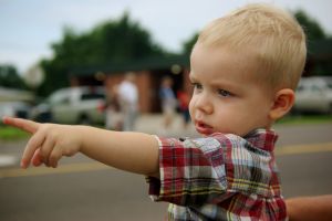 toddler pointing at something