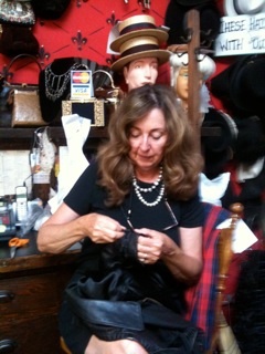 Seamstress Connie getting your costumes or collectible ready for you.
