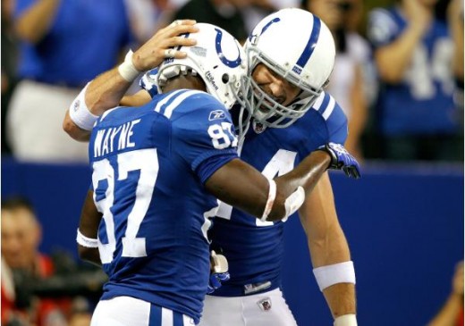 Indianapolis Colts wide receiver Reggie Wayne #87 celebrates after his touchdown catch with tight end Dallas Clark #44 during the game against the New York Giants at Lucas Oil Stadium in Indianapolis, Ind., Sunday, Sept. 19, 2010. The Colts defeated 