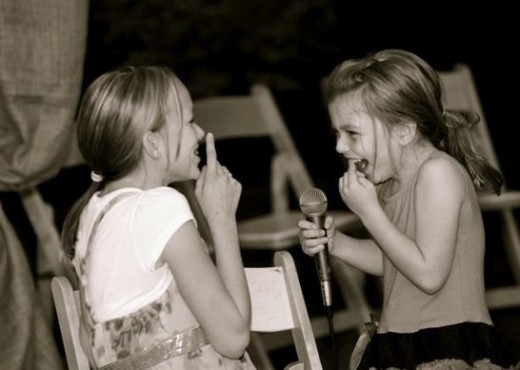 Christina with her adorable niece, who enjoys singing (and sings beautifully, as I have heard from a special recording of her singing "The Climb" by Miley Cyrus), following right in the footsteps of Christina and Ali