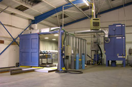 A picture of an industrial blasting room from a UK blast room specialist.