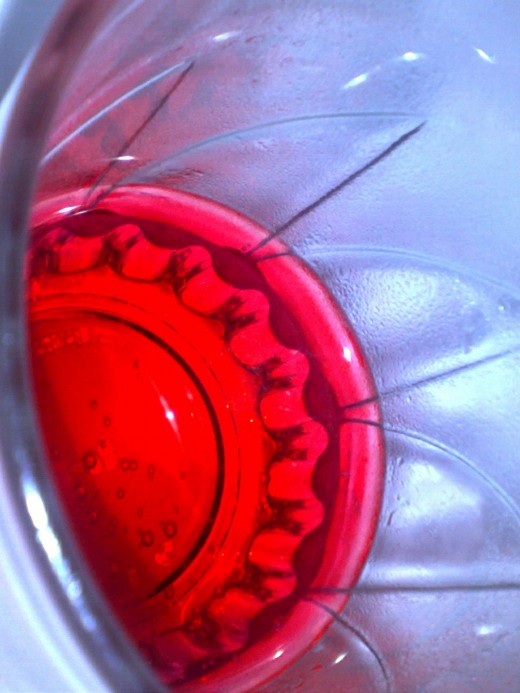 One day as I was playing around with my cell phone I saw this photo emerged as my cold-drink glass was close to empty. I experimented with the angles of the shot and Walla! I got this beauty.