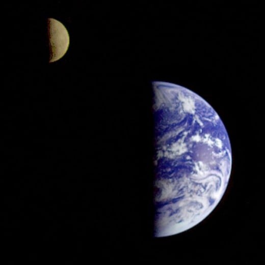 The Earth-Moon system in half-phase, from the Galileo probe.  Image courtesy NASA and Wikipedia.