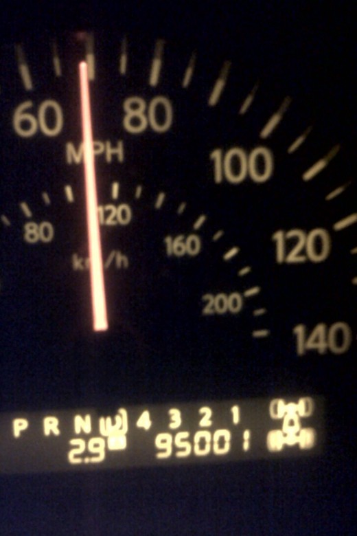 On my way home from dropping off Chris after watching the UT game, my truck rolled over to the 95,000 mile mark.  It took a solid mile to get a non-blurry picture with my phone, hence the 95,001