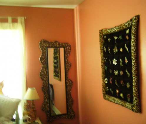 The wall hanging with vintage brooches. The wall hanging with vintage brooches.