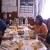 Filipina friends, dining onboard ship (IAA)