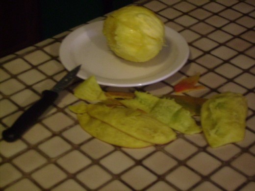 The fully peeled mango.