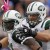 New York Jets running back LaDainian Tomlinson (21) celebrates a touchdown with teammate Matt Slauson during the second half of an NFL football game against the Buffalo Bills in Orchard Park, N.Y., Sunday, Oct. 3, 2010. The Jets won, 38-14. (AP Photo