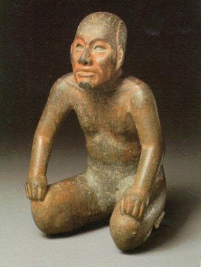 This figurine of a wrestler is true to nature and depicts the anatomical sculpting skill of the Olmec artisan.
