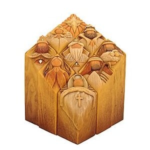 Enesco offers the Pillar to Heaven and several other collectible all-wood ornaments and home decorations. Jim Shore is another talented artist, whose Christmas décor and ornaments are equally as collectible.