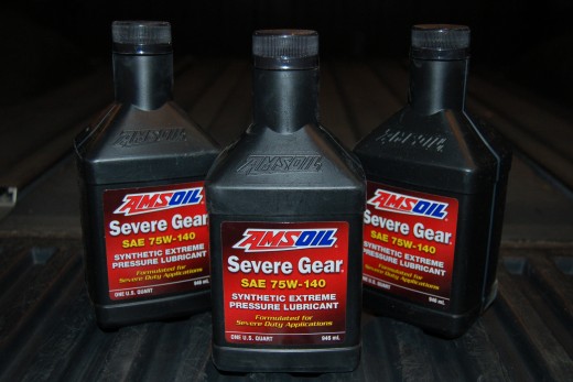 I finally got around to upgrading the oil in the Titan's rear end to some Amsoil gear oil that I picked up from EmiCamOil.com, I also got to break in that fluid pump I bought yesterday.  Note to self: Gear Oil STINKS!!!