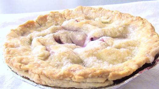 A close up of the mini- Super Star Triple Berry Pie.  Pie crust made with conventional oil-based dough recipe.