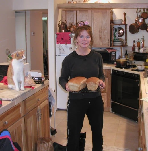 There is nothing like warm bread right out of the oven!  Please ignore the curlers...but NOT the cats!  This is the only pic I could locate w/me AND food.