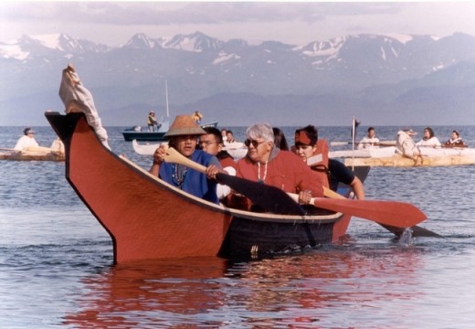 This is a Tlingit cedar dug out canoe that are still being made and used today. these are made from a single large log and are often used at sea as in this photo.
