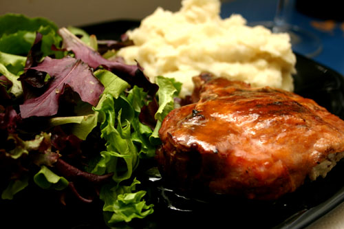grilled pork chops stuffed with chevre, walnuts, and apricots