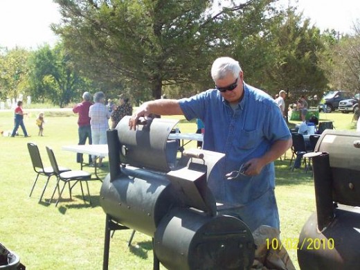 Checking the grilled hotdogs!  They smelled so-o good!
