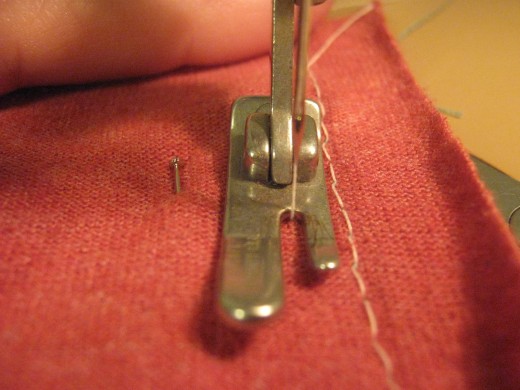 Since we want the seam at the crotch reinforced, it is easier to just start at the bottom of the leg and sew another seam just like the previous step. Line your first seam up against your presser foot and follow the stitches around.