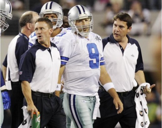 Dallas Cowboys quarterback Tony Romo leaves the field during the second quarter against the New York Giants in an NFL football game Monday, Oct. 25, 2010, in Arlington, Texas. Romo was drilled into the turf on his left shoulder, forcing him to the lo
