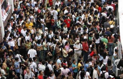 Lining up to find overseas jobs as seen in a Metro Manila city.