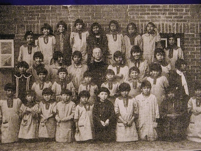 Entitled "Fallen Feather" this photo shows some of the thousands of children that were abducted well into the 20th century for assimilation.