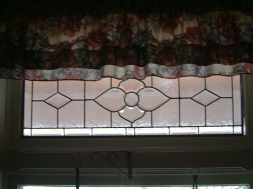 Window Transom made from glass,beveled glass and lead cane. Made and designed by Susan Zutautas