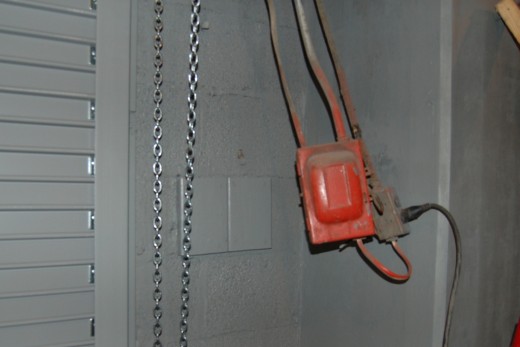 Back to the warehouse, Randy and I installed some boards so we could remount the fuel shutoff box and electrical box back to the wall.  I then painted the wall & boards gray.