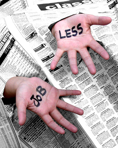 open hands with employment section of newspaper with words written on the palms "j less"