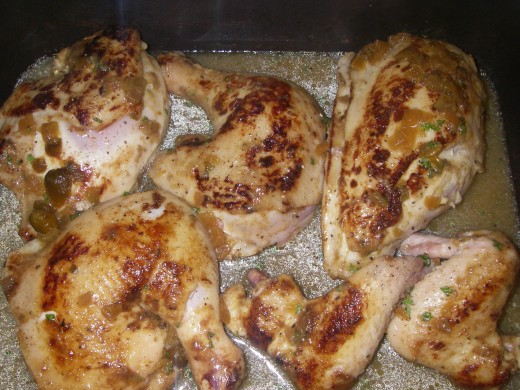 Place into a baking tray. Add chicken stock and the remaining lime pickle marinade, cover with foil and bake for 40 minutes.