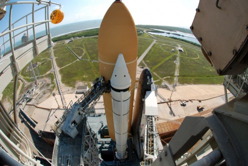 View of the External Tank, Solid Rocket Boosters, and Space Shuttle Discovery from the FSS. The RSS has not been rotated into position around the shuttle yet.