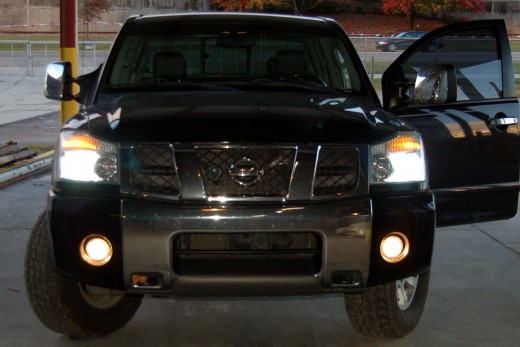 Tonight I upgraded the low beams to an HID kit.  This picture doesn't do the new bulbs justice.