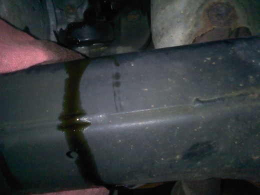 Oil filter placed over crossmember creates a lot to clean up when replaced