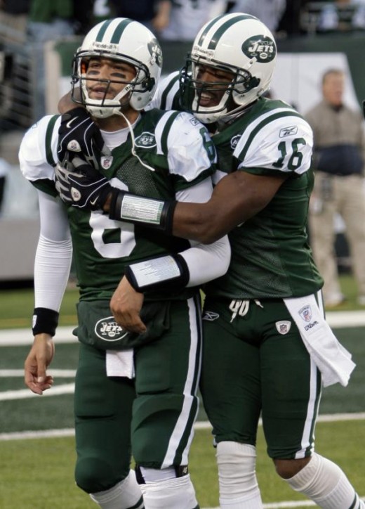 New York Jets Brad Smith (16) celebrates with quarterback Mark Sanchez (6) after Sanchez threw a touchdown-pass to win an NFL football game during the fourth quarter against the Houston Texans at New Meadowlands Stadium, Sunday, Nov. 21, 2010, in Eas