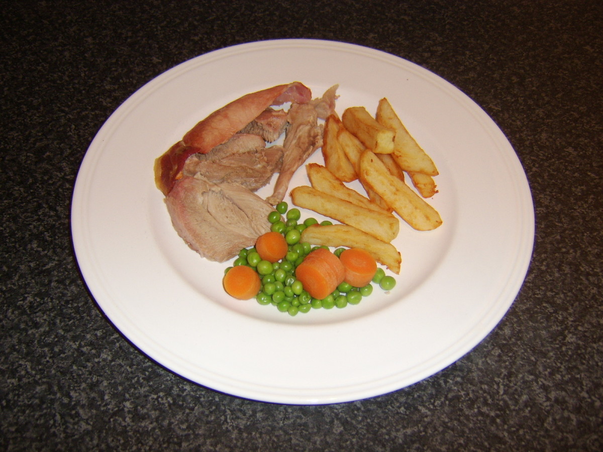 Roast Turkey with Bacon, Chips, Carrot and Peas