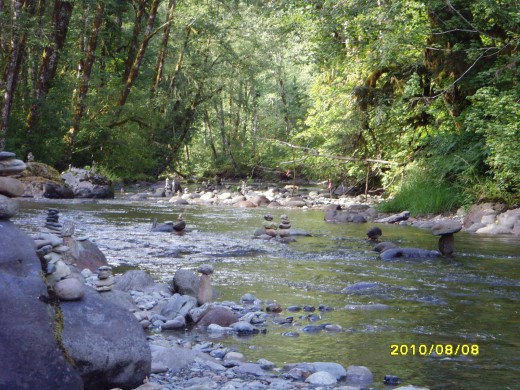 zen rock piles at the river