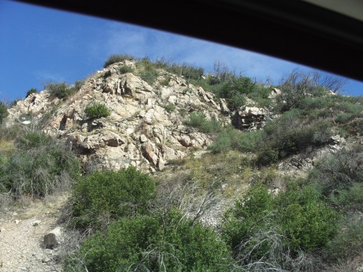 The beautiful rock formations and brush as seen on Highway 18