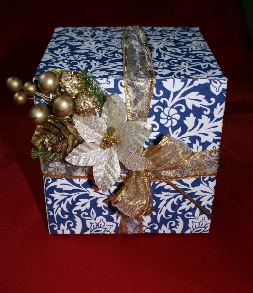 Combination of ribbon, bow and tied on decoration.