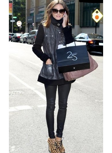Olivia Palermo wearing leopard boots