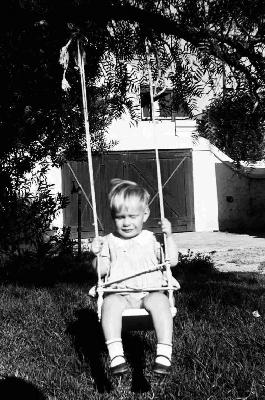 Me on the swing at the back of Queenie's house.