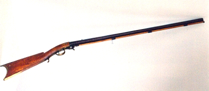 This underhammer smooth-bore rifle was made using a barrel from a Springfield rifle that didn't pass government inspection.  Guns like this are what the '49ers carried to California.