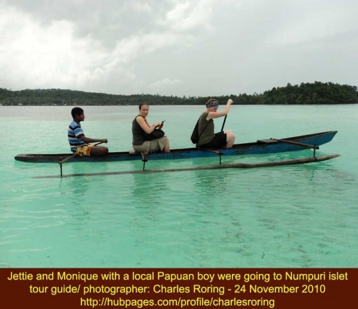 Rowing with a canoe from Numfor island to Numpuri islet