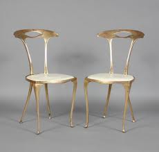Slender and elegant gilt Italian side chairs