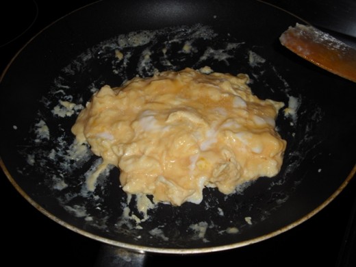 When the egg is almost cooked you can flip it over with a spatula to cook the top side